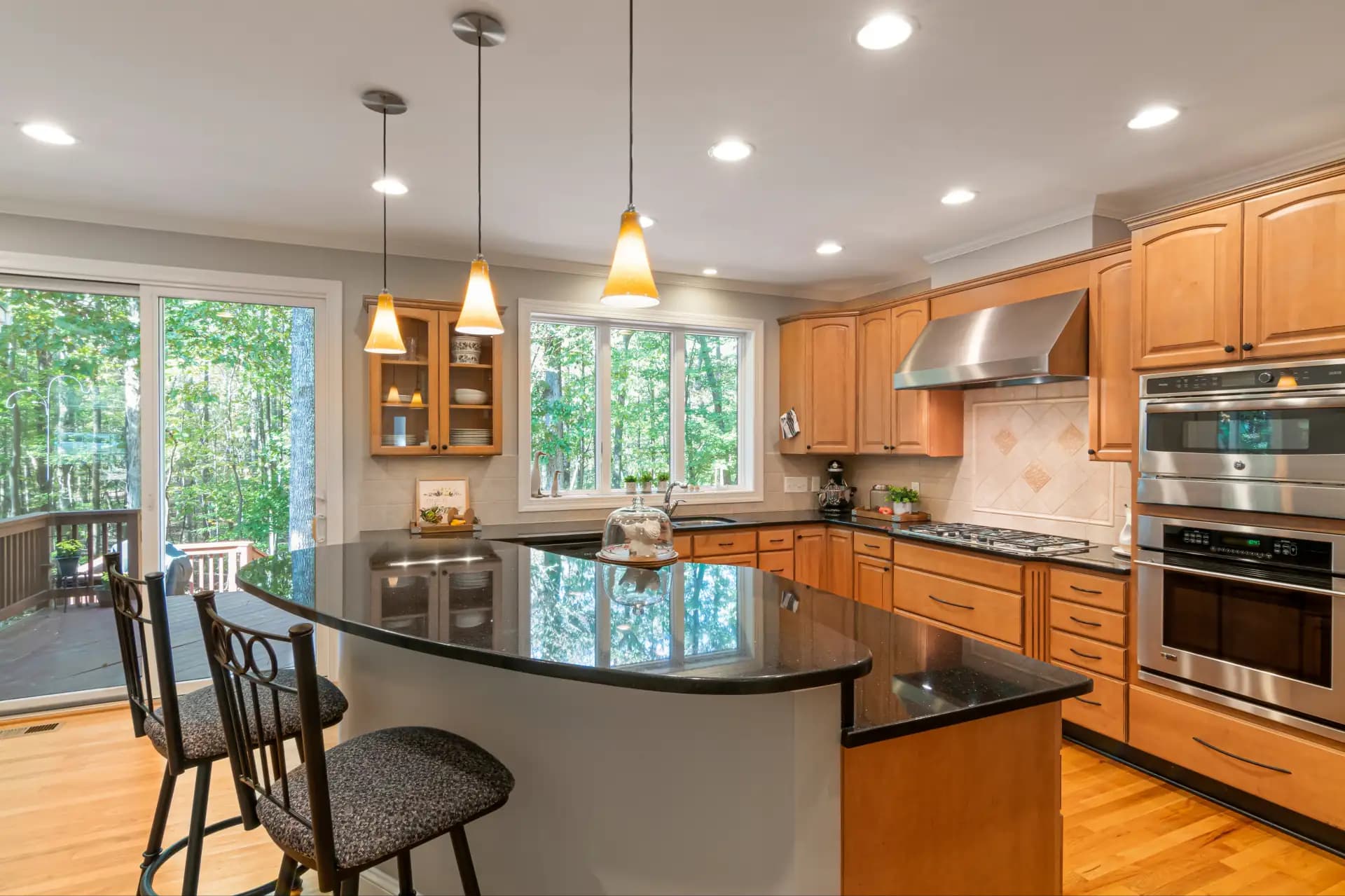 Kitchen with wooden cabinets and polished countertops after a deep cleaning in Downtown Los Angeles