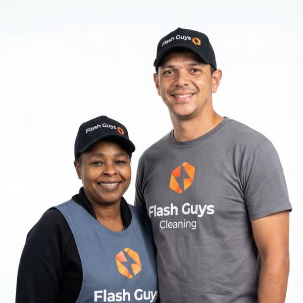 Joyce and Marcus, a Flash Guys Cleaning family team, in uniform